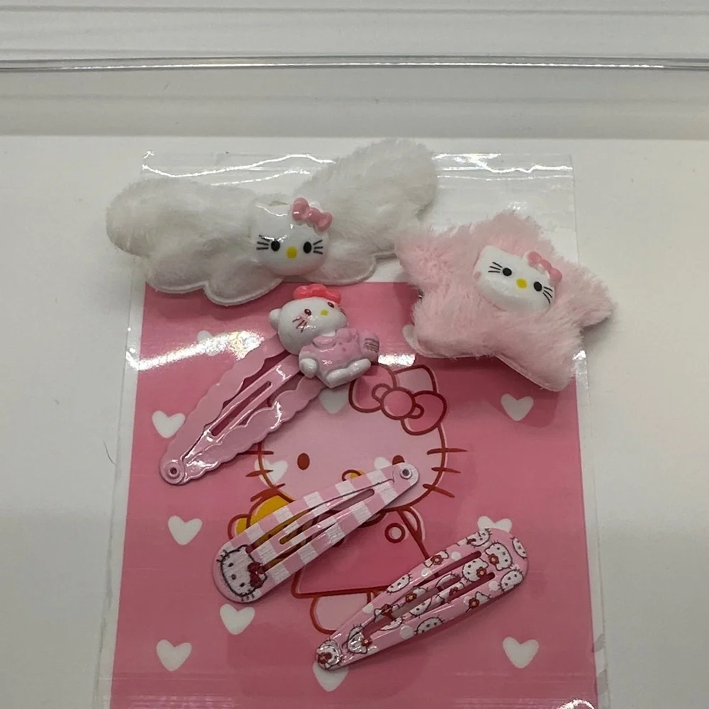 3/$15 🌼 Hello Kitty Pink and White Hair Clips Set